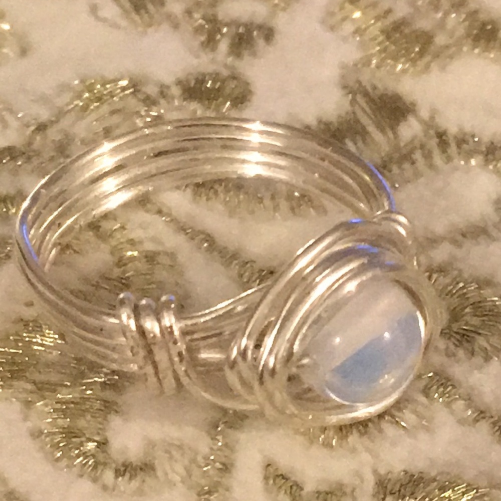 Opalite Silver plated wire wrapped ring .